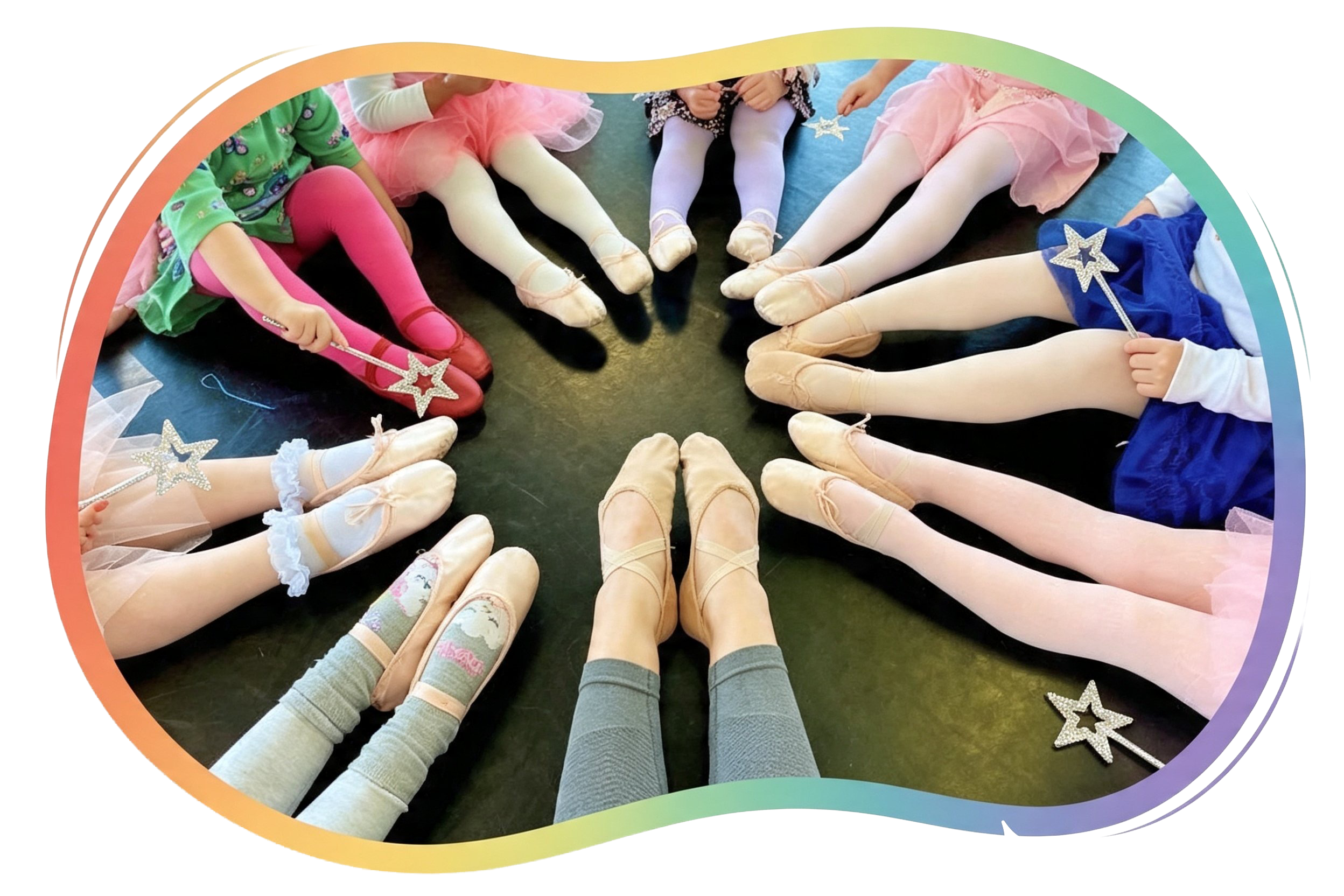Tiny Acorns dancers with their ballet shoes in a circle